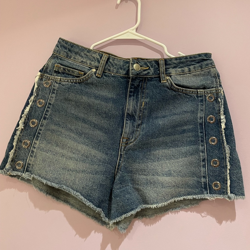 Zara shorts with circular metal designs on both sides. Runs big andhigh waisted
